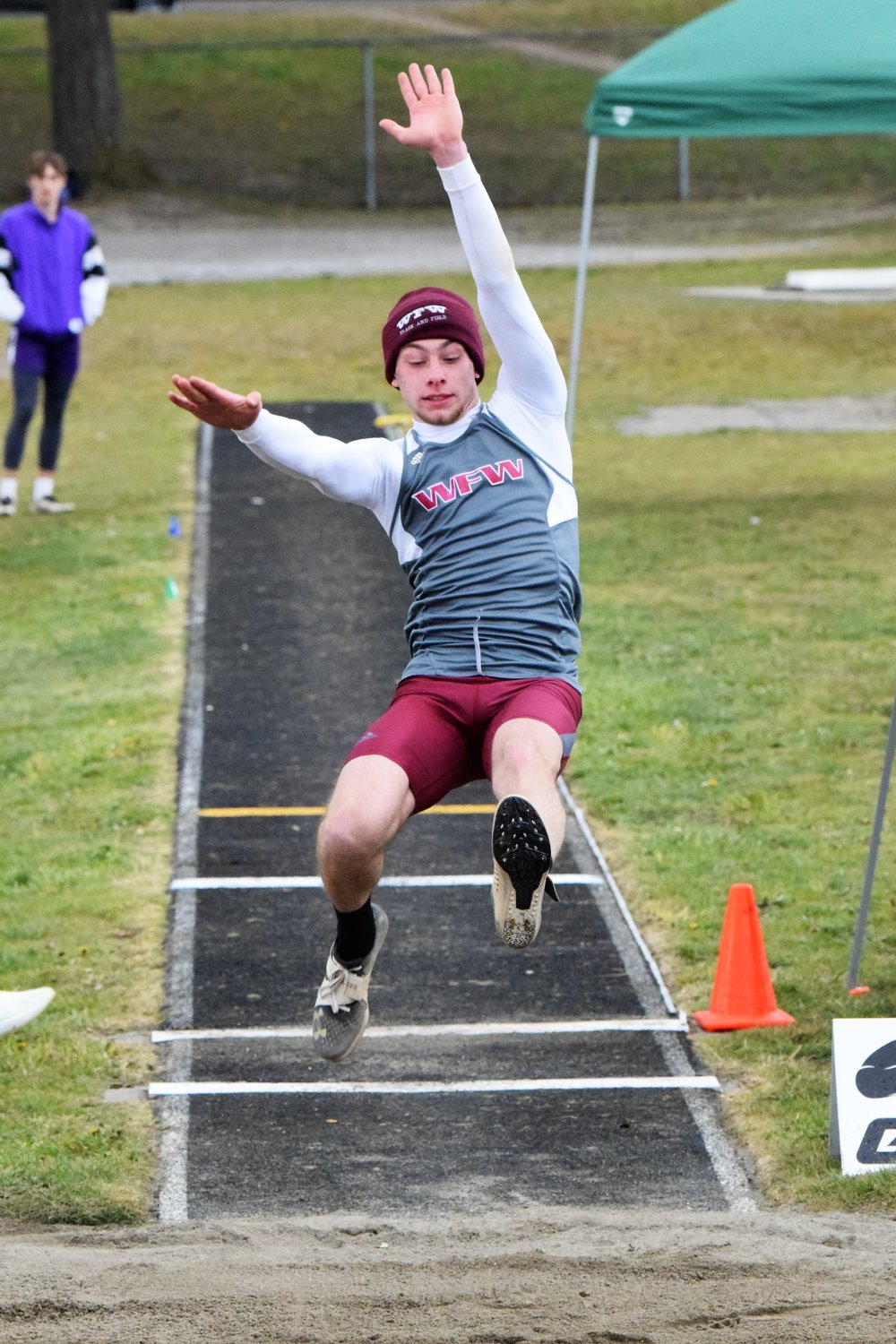 W.F. West's Seth Hoff participates in the long jump at the Lil Norway Invite April 16.
